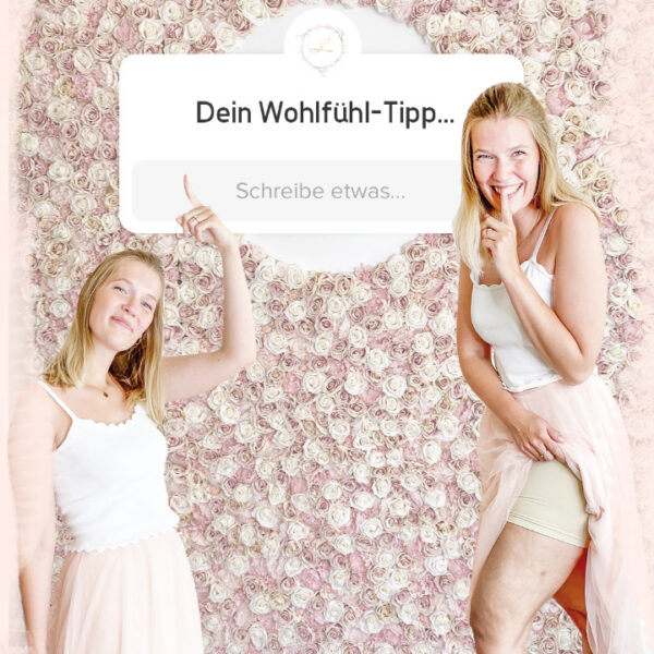 jobs-mitarbeiterin-vor-blumenwand